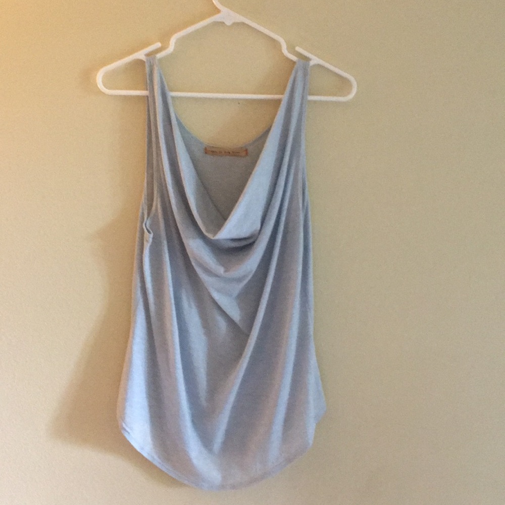 Blue tank top with folded detailing.